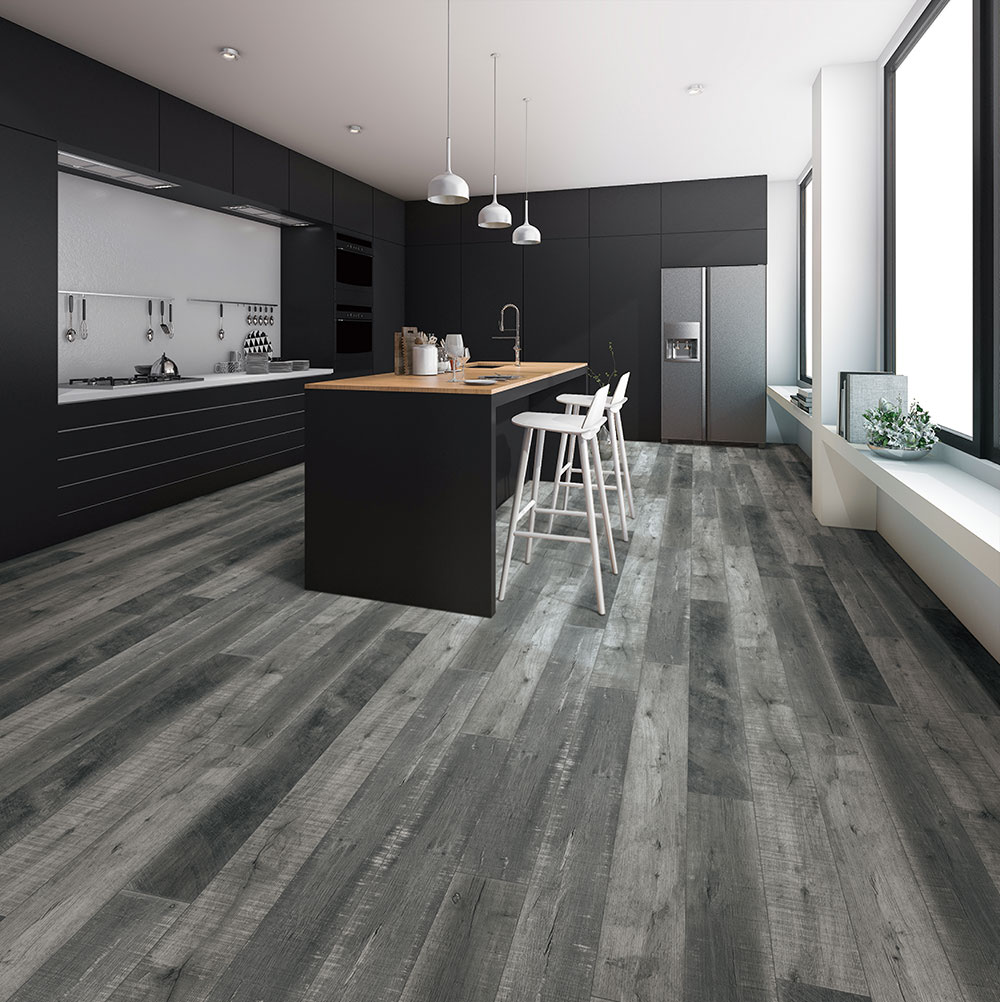 Modern kitchen with dark wood-look vinyl flooring, black cabinets, and a central island with bar stools.