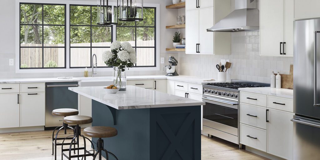 Modern kitchen with white cabinets, blue island, and large windows
