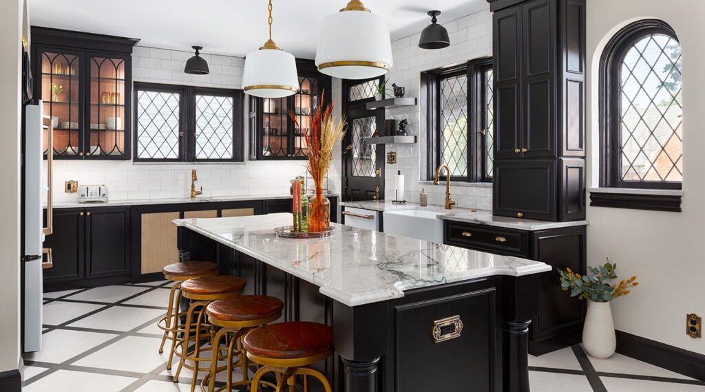 Elegant black and white kitchen with marble countertops and custom cabinetry