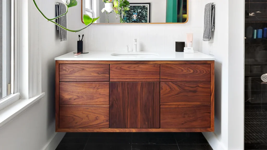 Modern floating bathroom vanity with dark walnut finish and white countertop